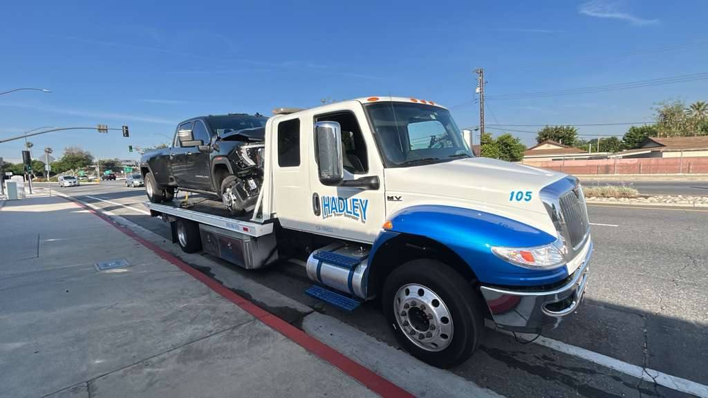 Hadley flatbed post-accident recovery scene