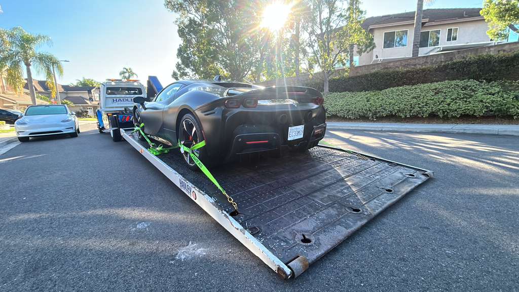 Rear low-angle of Ferrari SF90 on fully flat zero-degree deck
