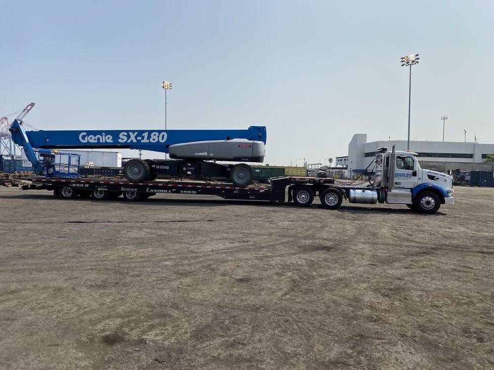 Genie SX-180 telescopic boom lift on Hadley landoll